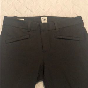 Dark grey GAP skinny slacks.